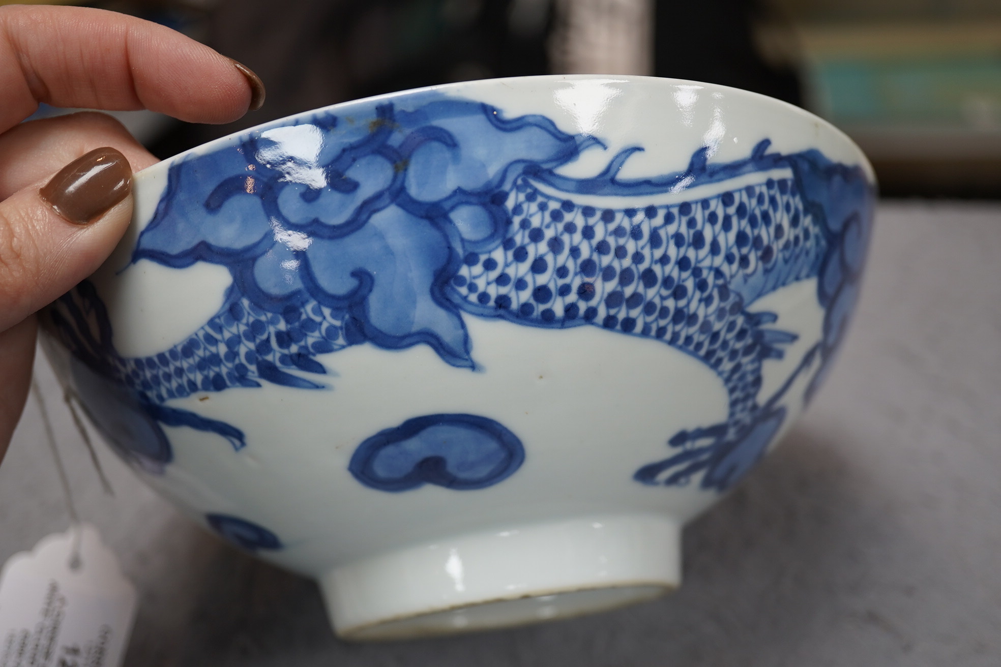 A Chinese blue and white ‘cloud and dragon’ bowl, Yongzheng mark and period (1723-35)